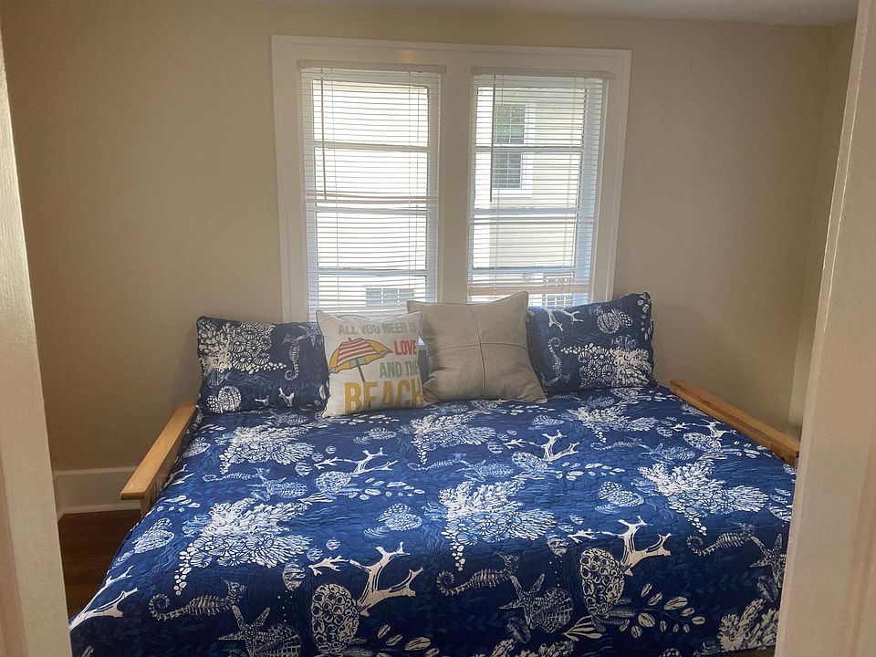 Bonus second bedroom has enough space for a queen futon, comes with mounted TV, lots of windows