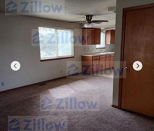 view of living area from front door