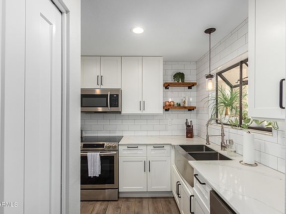 5th image of 7024 E 6TH Street #106