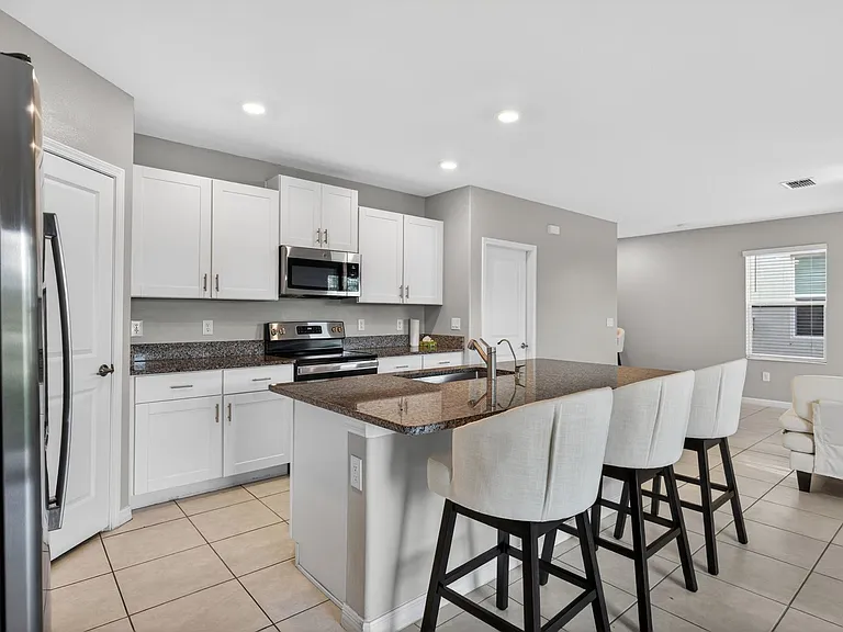 9909 Calypso Orchid Ct — Photo 43