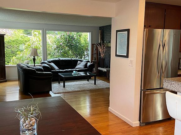 Kitchen off to the right, dining and living room