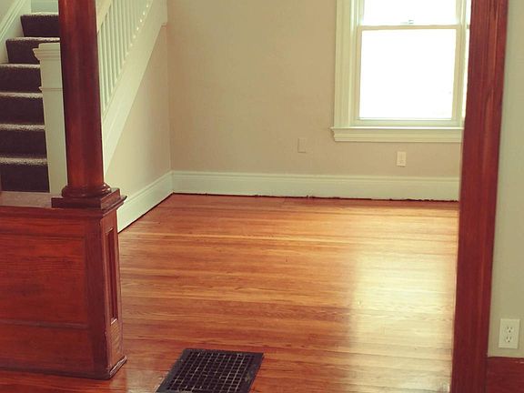 from living room to entry. Beautiful gumwood trim.