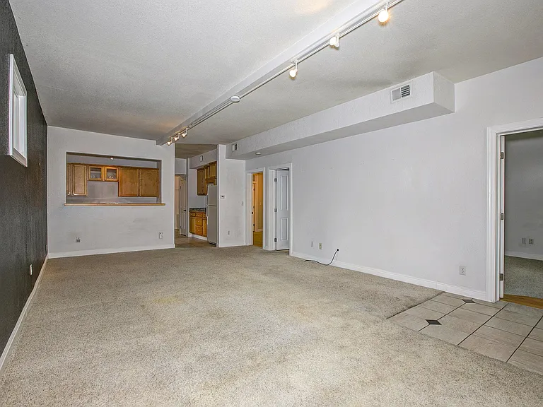 Ignore carpeting, lighting and wall between kitchen and living/dining room, this is all updated