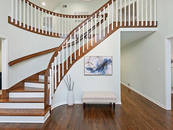 Grand Entry with Sweeping Staircase