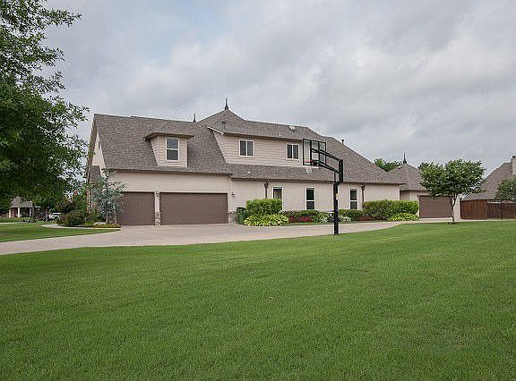 Second garage makes five car capacity