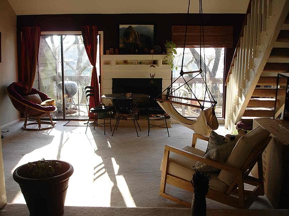Living room with balcony overlooking marina