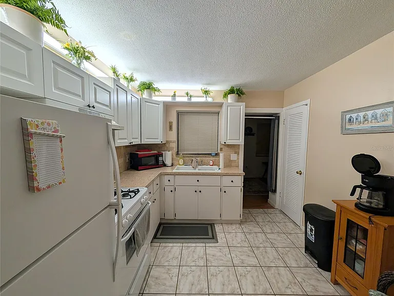 9911 Dahlia St N #38 — Photo 18