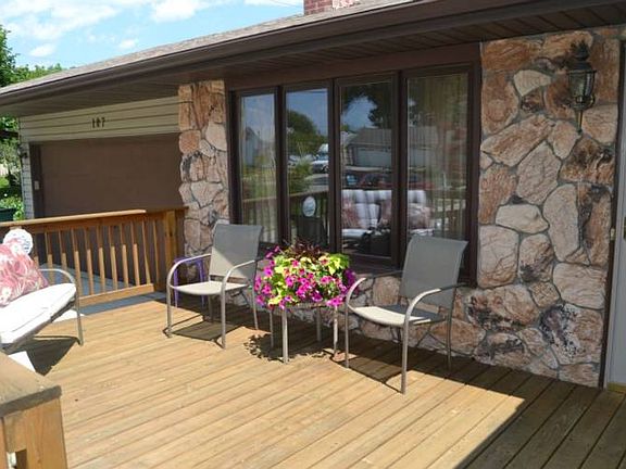 The front deck has plenty of room for furniture.  You have a choice of watching what is happening in the neighborhood or you could use the private back deck.