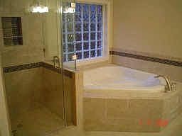 Master bath,Oversized jacuzzi tub, all glass shower, double sinks w granite