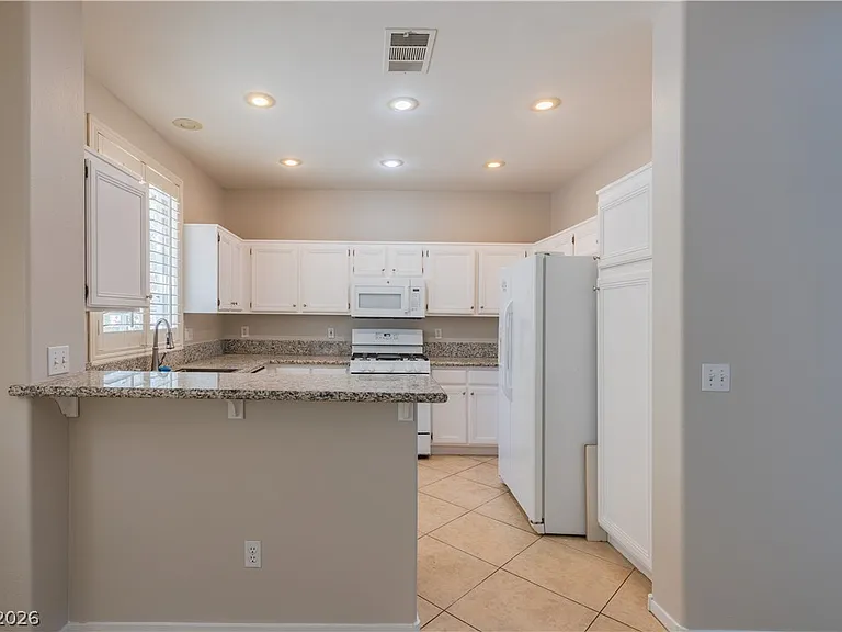 10517 Jeremy Ridge Ave — Photo 11