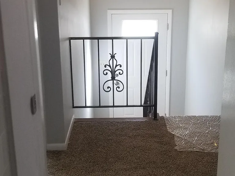 2nd floor looking at front door and foyer