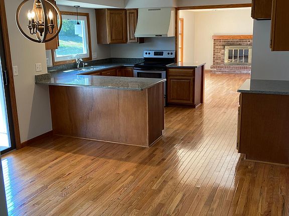 Open concept dining, kitchen, family room