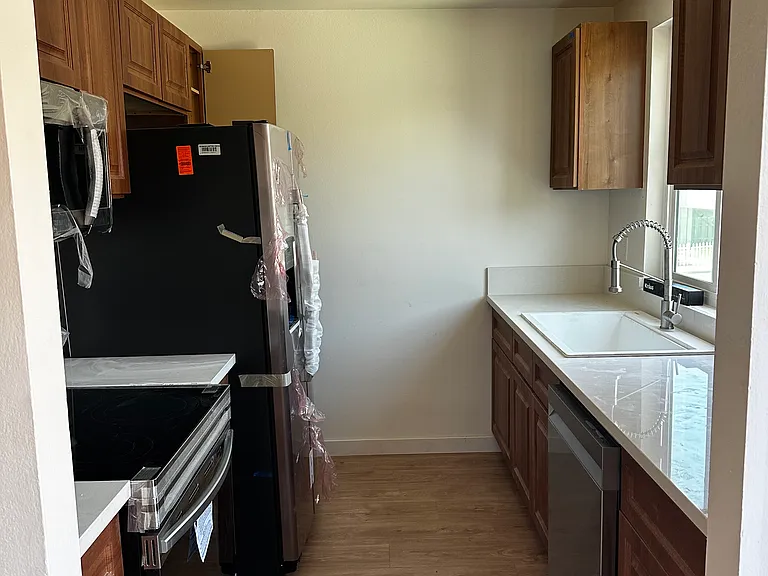 Kitchen with ALL New high-end All Electric Appliances, including Dishwasher and Microwave (New Photo to Follow with New Lighting (not shown in this Photo) and New Blinds