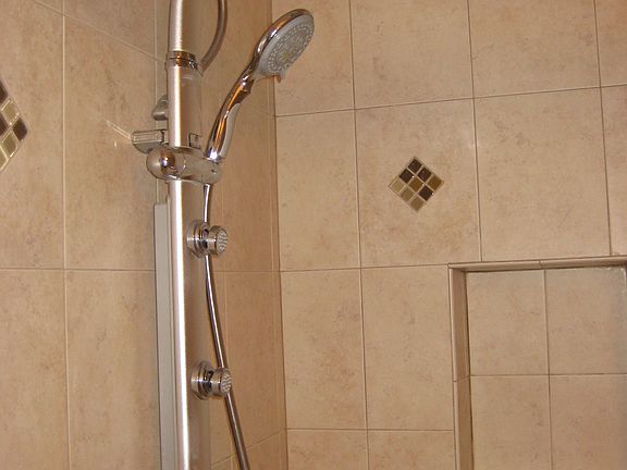 rain shower in master bath with body jets