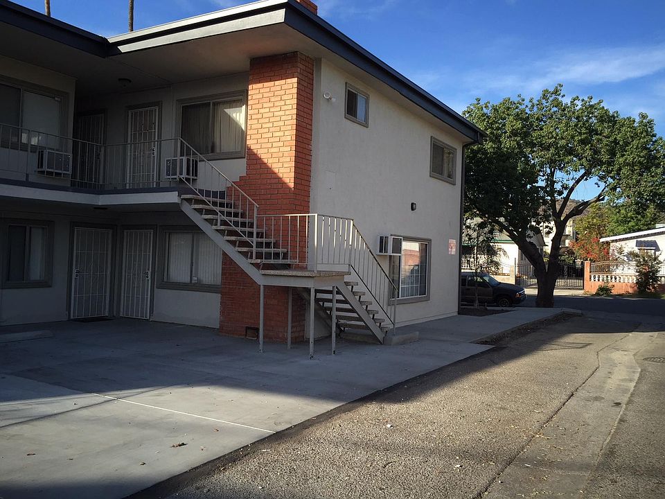 Side of building from alley showing units 1 and 3.