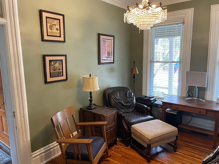 First room is an office or 3rd living space. Couple with two built in bookshelves