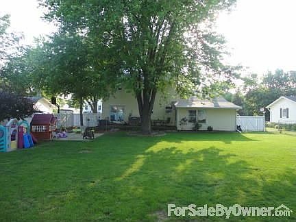 Back of Home
						:
						Large back yard heaven, with deck & patio also has white vinyl fencing.