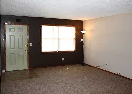 UPON ENTERING THIS LIVING ROOM YOU WILL NOTICE THE WARMTH OF A CLEAN & WELL CARED FOR HOME. BRAND NEW CARPET THROUGHT OUT.