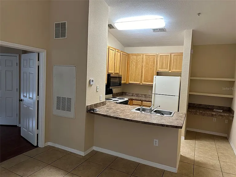 10111 Courtney Palms Blvd #201 — Photo 11