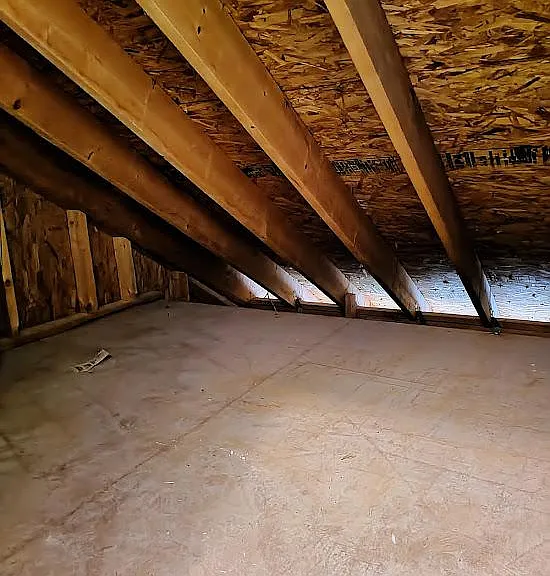 Floored attic space for storage.