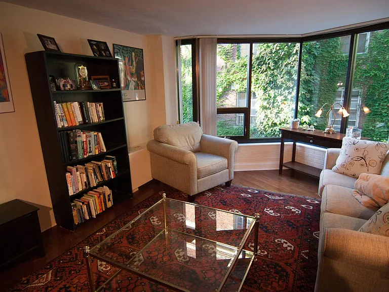 Living room with hardwood floors and a direct view to Delaware Avenue