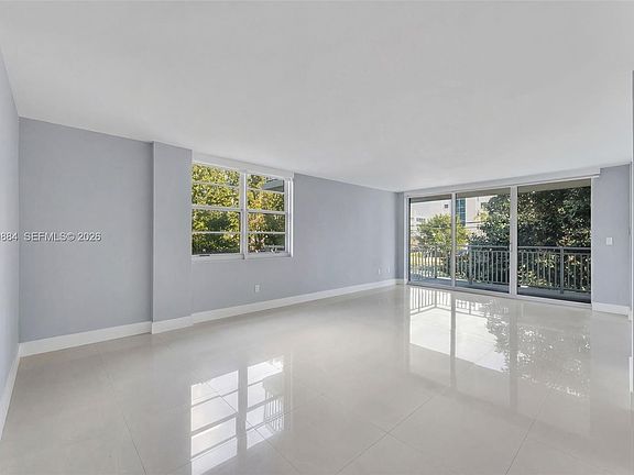 3rd image of 9500 W Bay Harbor Dr APT 2H