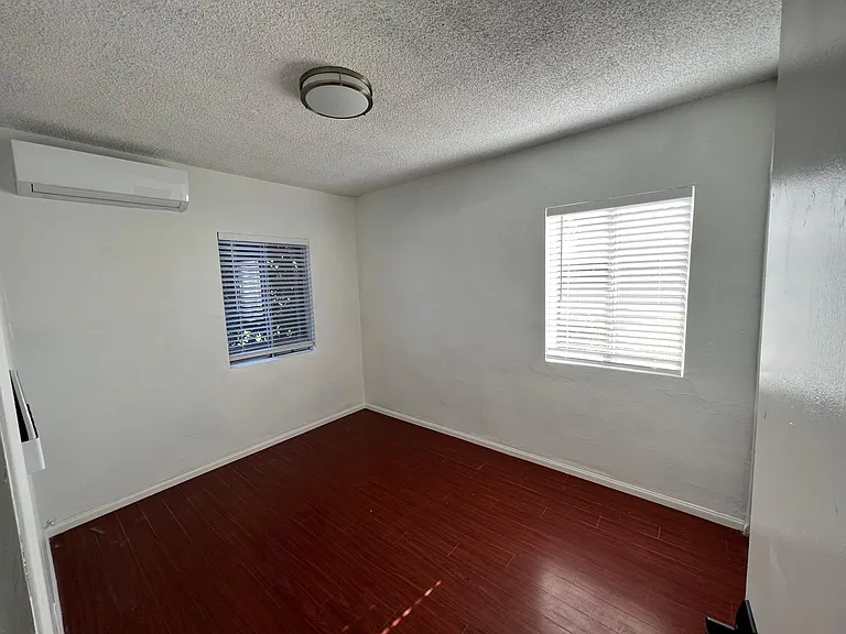 Master bedroom towards the back of the house for optimal privacy from the street. Two large windows for lots of natural light.