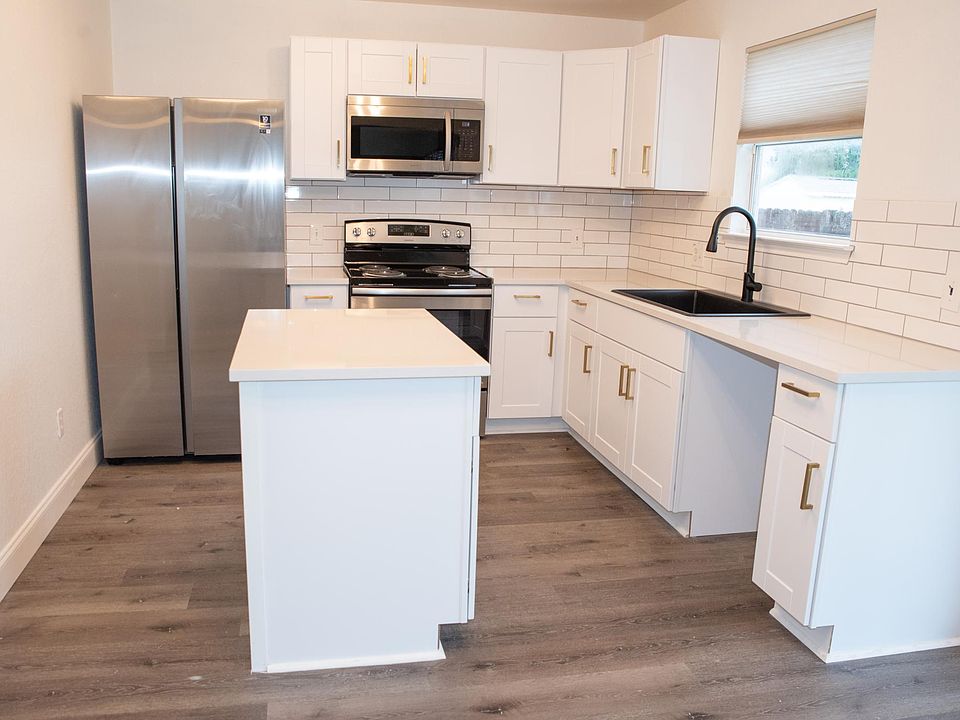 Modern and Fully Remodeled Kitchen - All new appliances including fridge, range, microwave and dishwasher (not pictured)