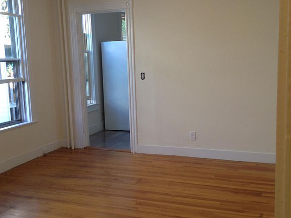 View of central room from front door entrance to apartment.