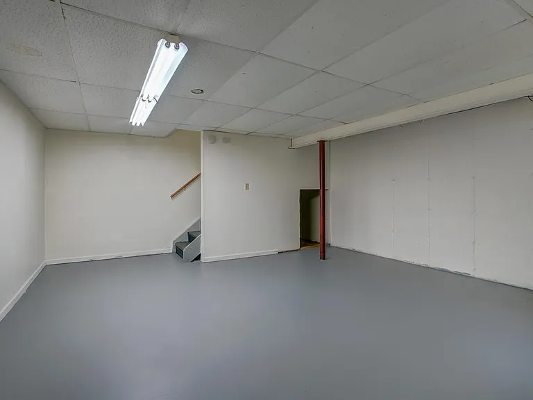 Basement with painted concrete floor