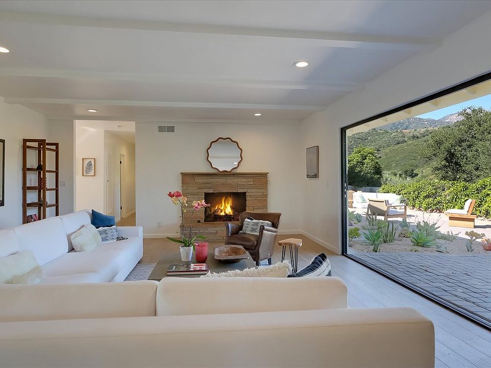 Panoramic doors join your living room with your back patio.