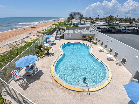 Pool with umbrellas and sundeck