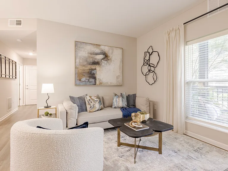 Newly Renovated Living Room with Hardwood-Style Flooring