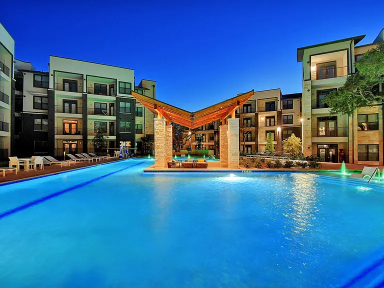 The swim-up lounge and sunken living room make our pool unique.