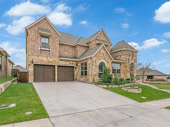 Gorgeous curb appeal as you arrive.