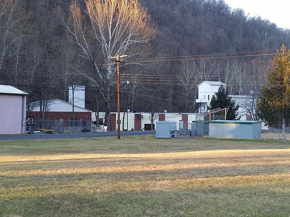 This apartment is in the rear of this building