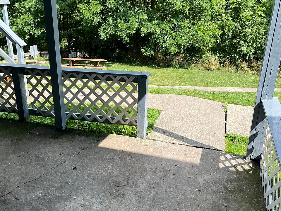 The front deck is a nice place to sit, with a relaxing view of greenery. Both the deck and the picnic table amenity nearly are fun locations for outdoor dining in the good weather.