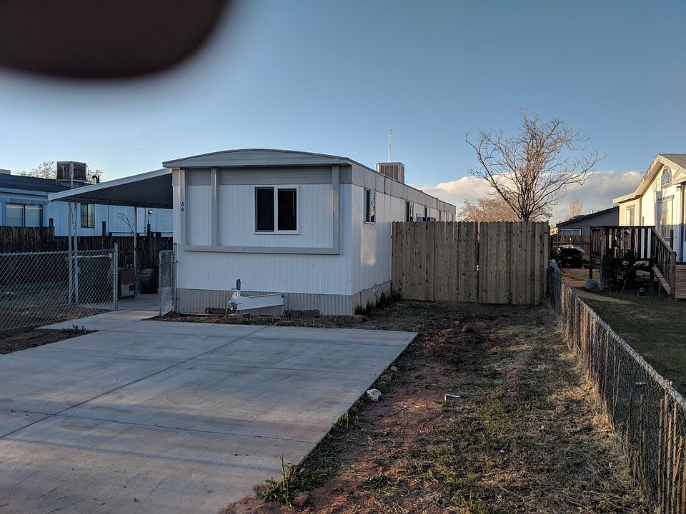 Front of trailer, off street parking and fenced yard