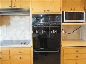 Kitchen stovetop and double wall ovens