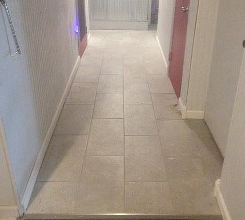 New concrete look tile in the hallway, galvenized metal acce