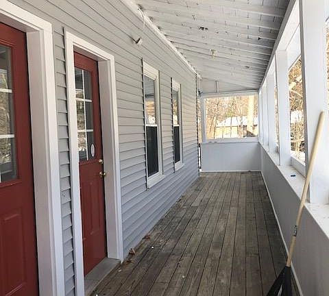 Porch at rear entry overlooking river