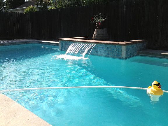 Pool with water feature