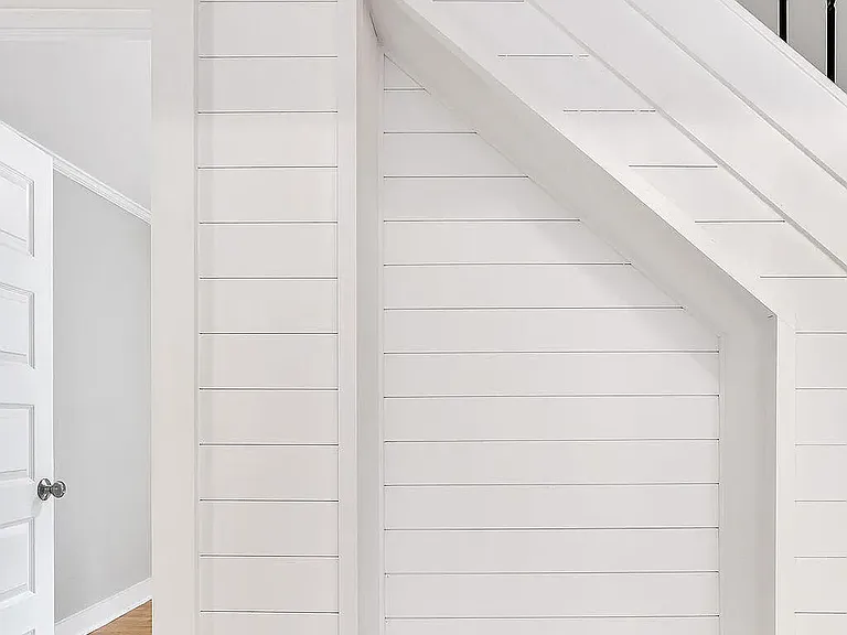 *original listing photo from when we purchased the home (downstairs hallway)