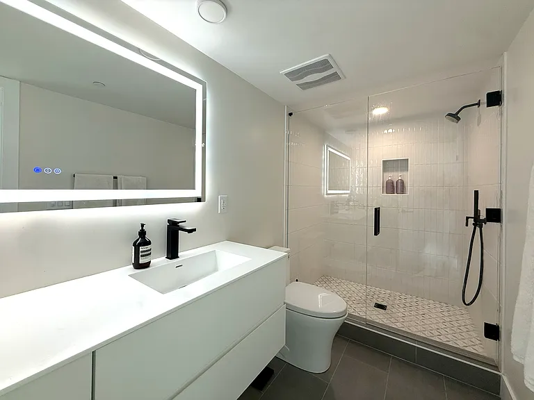 Guest bathroom with shower and double vanity