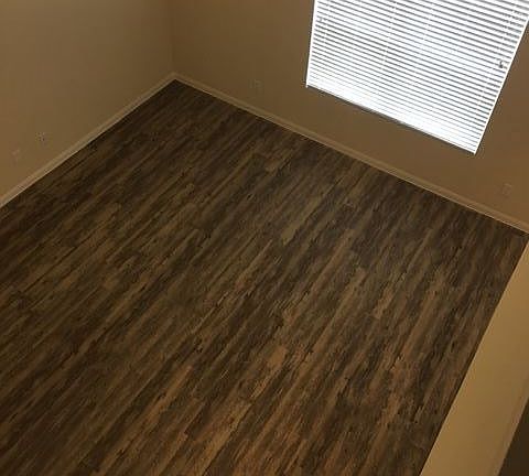 Upstairs over looking the family room. Hardwood laminates d