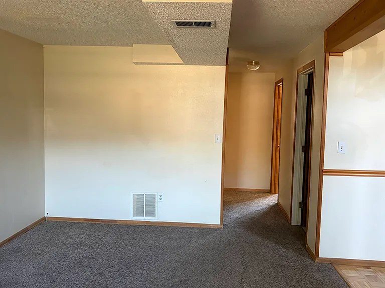 Downstairs Living Room facing Hall to Bedrooms and Bathroom/Laundry Room