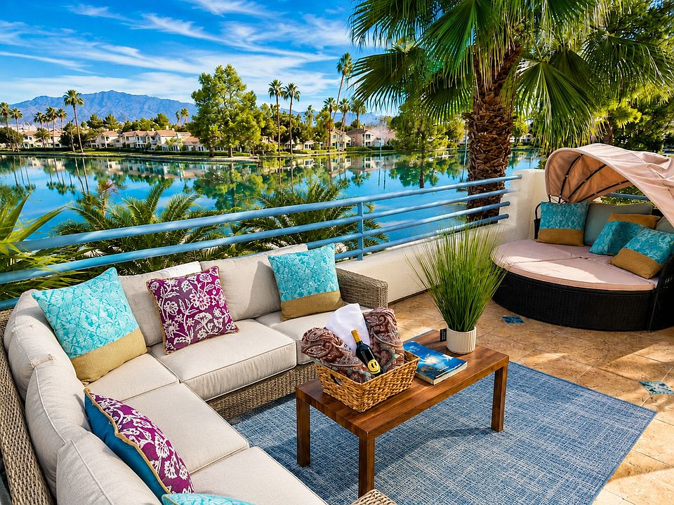 deck off the master BR - Unobstructed view of the mountains, the lake, and the beach just left of the lake.