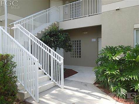 1st floor condo (right hand side)- 2br, 2 ba with enclosed lanai and great lake view. Unit is tile throughout.