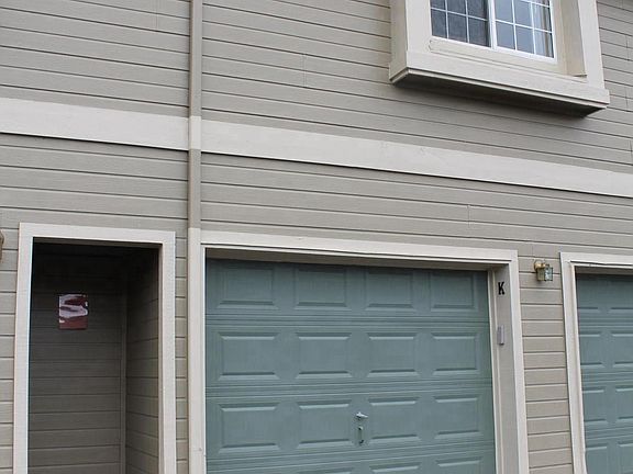 Attached, oversized one-car garage with extra storage.