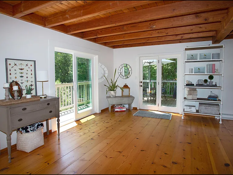 Main level showing door to deck with Weber Kettle BBQ grill